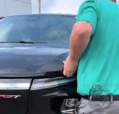WATCH Moronic Car Salesman Almost Loses His Digits Trying The Frunk Finger Test